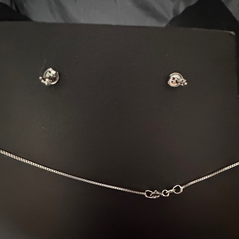 18” 925 Sterling silver w/CZ’s crossover necklace and earrings set in a red box